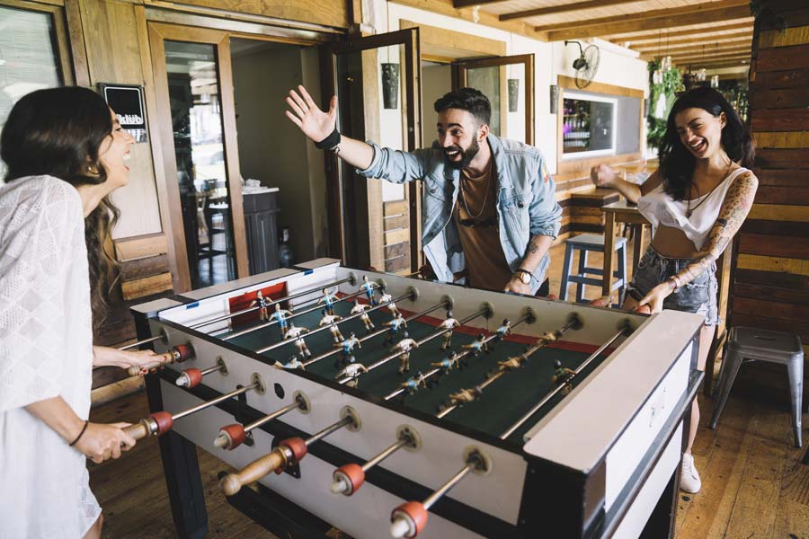 people having a great time inside a rumpus room