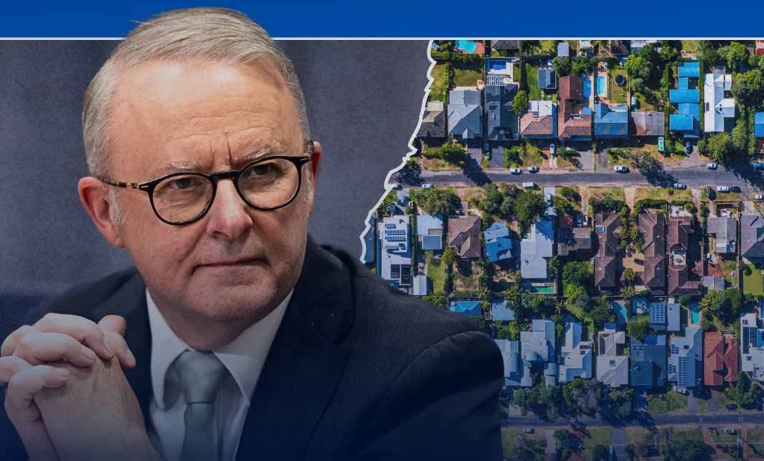 Anthony Albanese speaking about the Home Guarantee Scheme with houses behind him